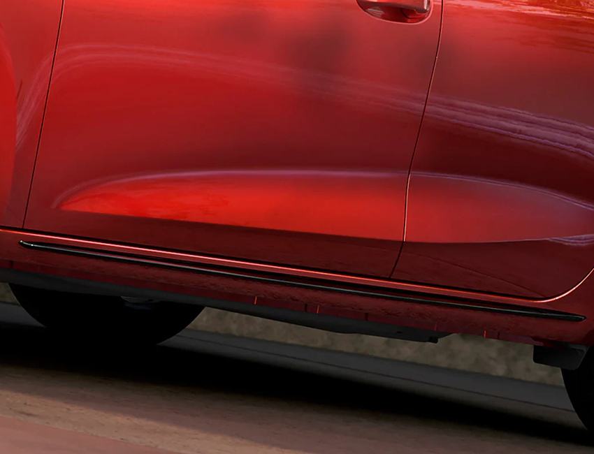 Vue avant dynamique de la Seat Leon 2025 sur route de nuit